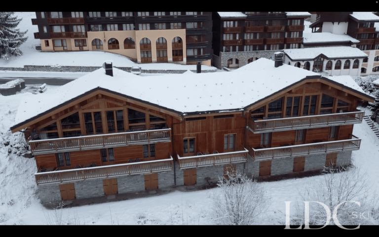 Snow-covered exterior of Chalet Flocon in Les Coches, La Plagne