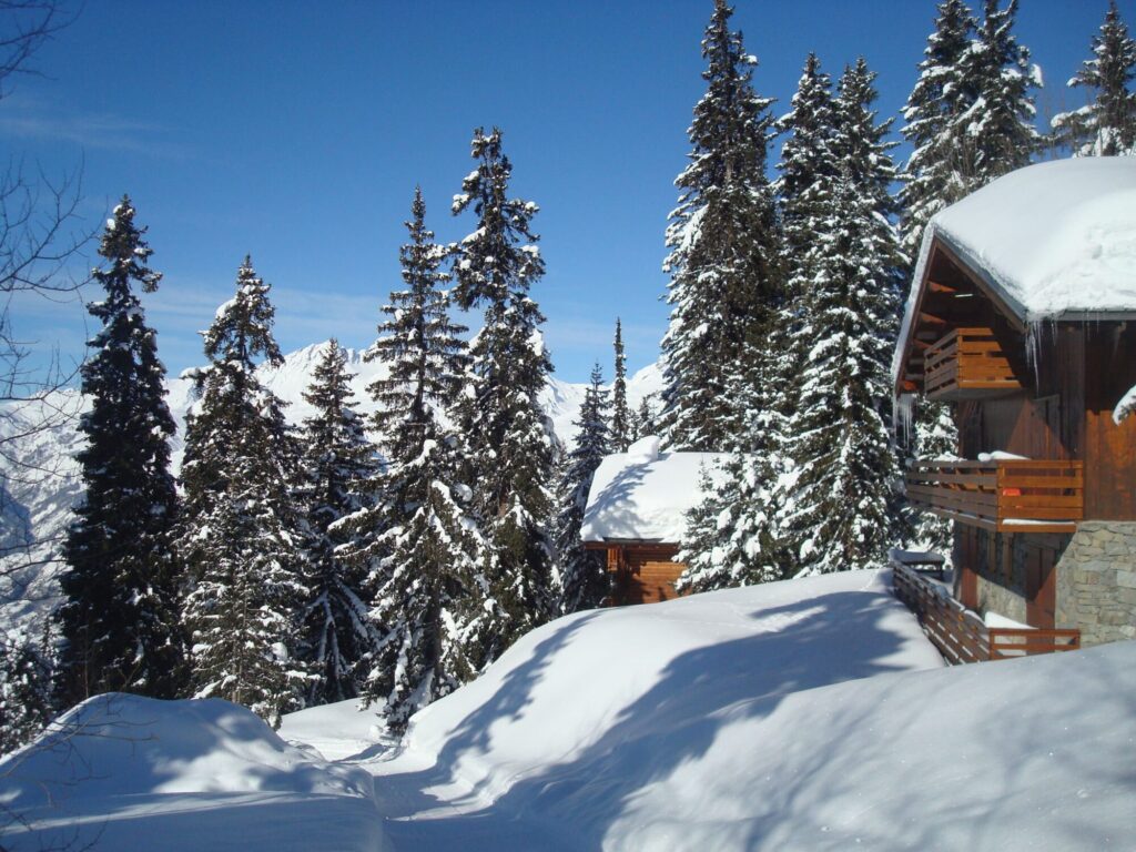 Traditional snow-covered chalets in Le Gollet, La Rosière