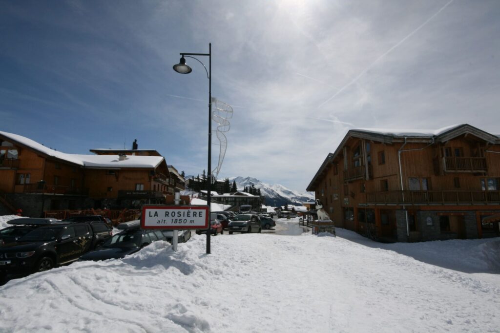 Winter view across La Rosière with resort buildings and snowy mountain slopes