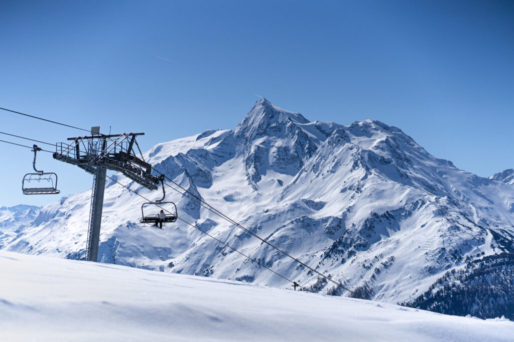 Ski lift and snow-covered mountain slopes in the La Rosière ski area