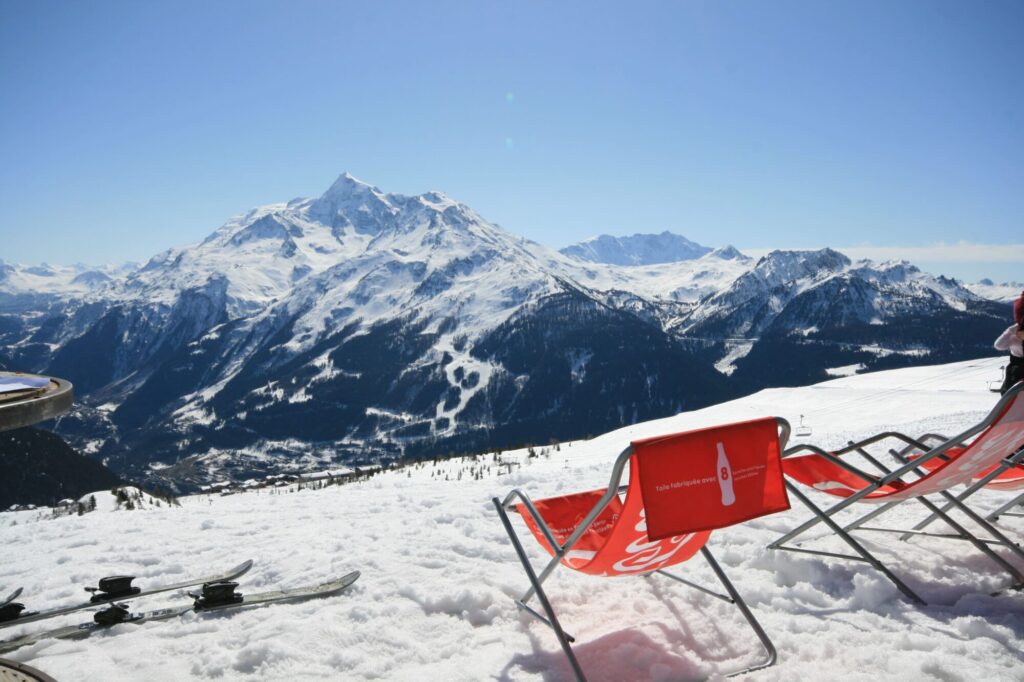 Mountain panorama viewed from a sunny ski piste in La Rosière