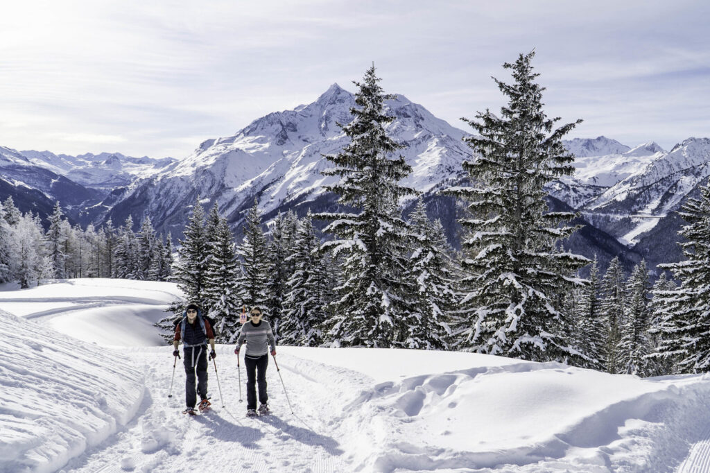 Snowshoeing through fresh snow with views towards Mont Pourri in La Rosière