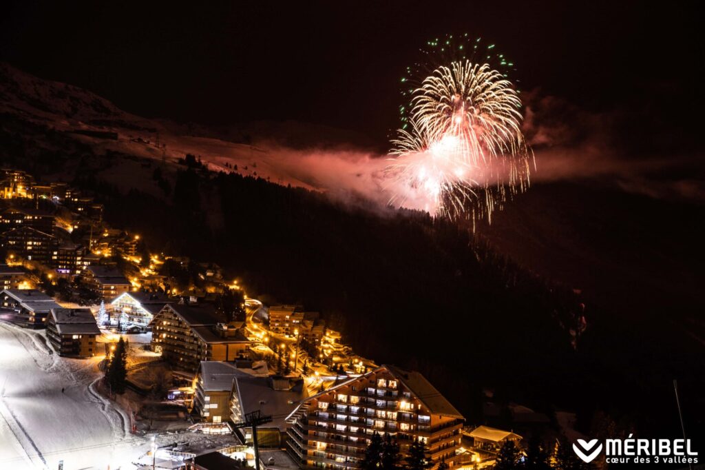 Fireworks lighting the night sky above Méribel ski resort