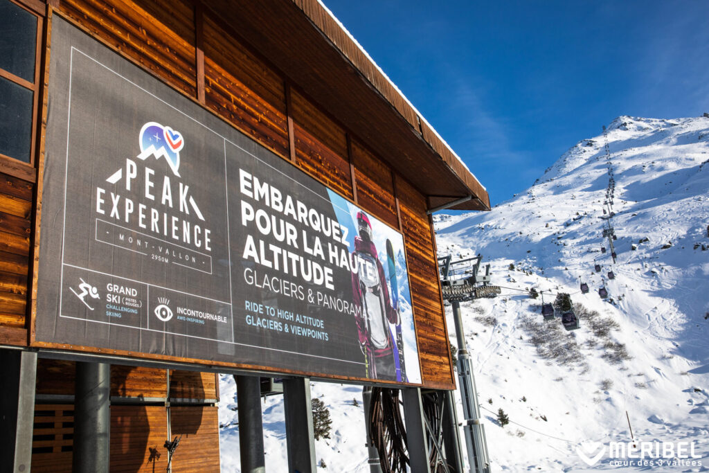 Peak Experience sign high in the snowy Méribel ski area