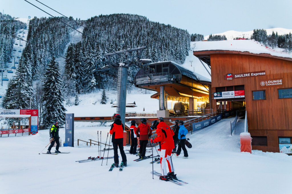 Skiers boarding a lift in the Méribel ski area
