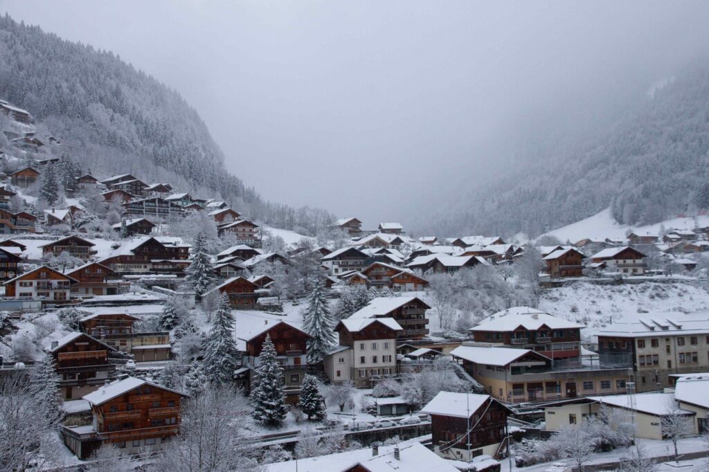 Snow-covered chalets and village buildings in Morzine