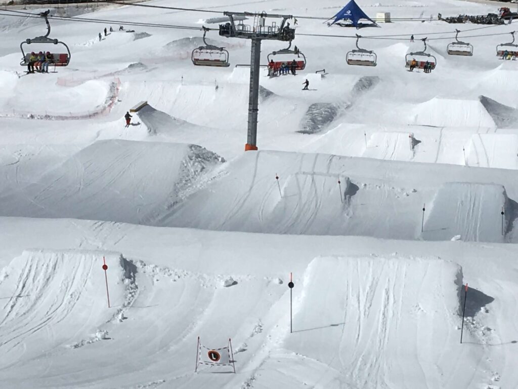 Snowpark features and ski lifts on the snowy slopes around Morzine