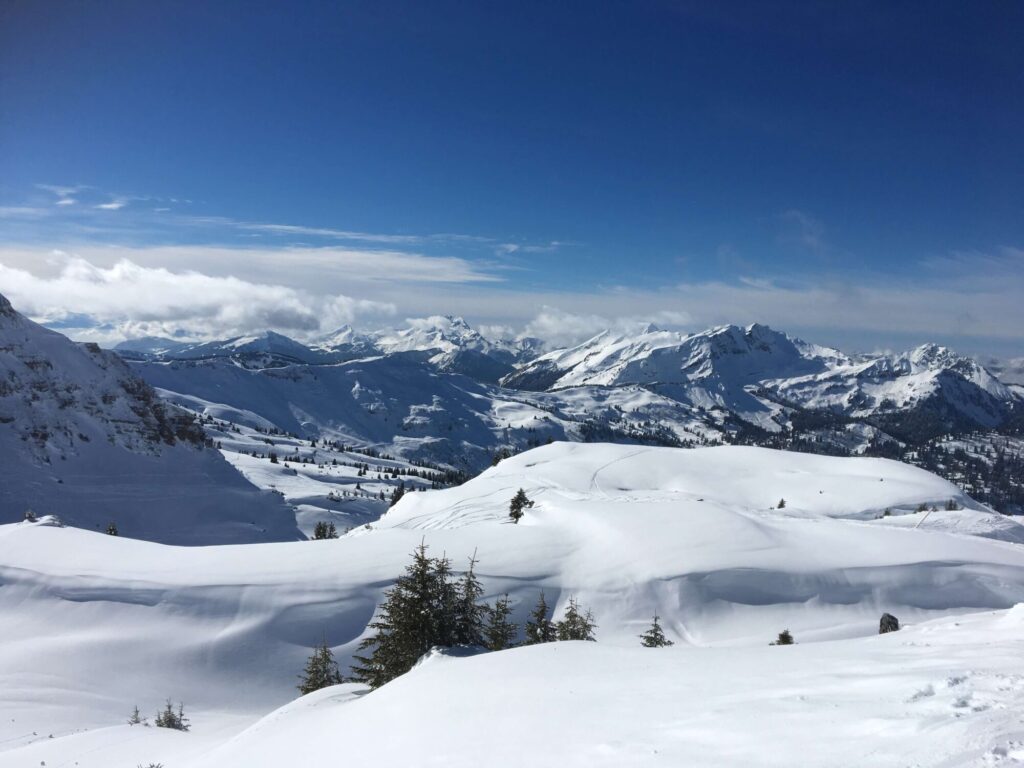 Expansive snow-covered mountain landscape viewed from the Morzine ski area