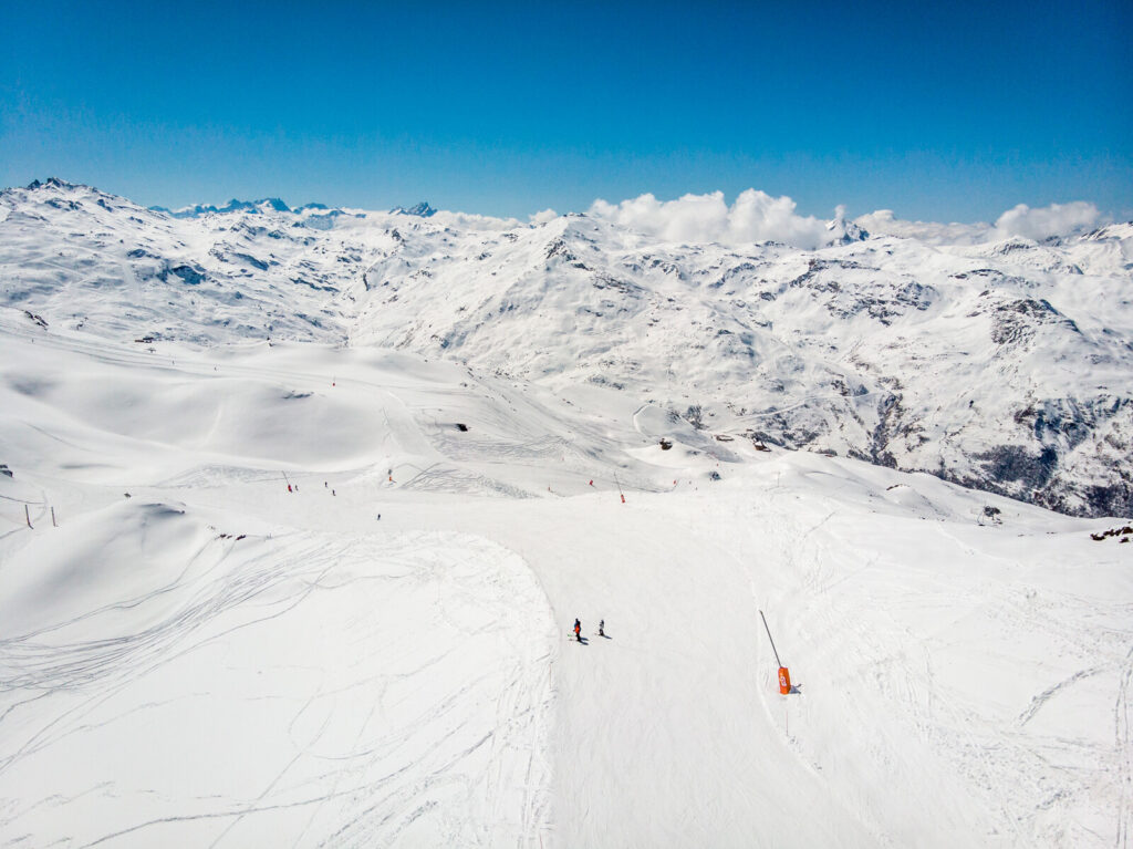 Panoramic view across the snow-covered Three Valleys ski area above St Martin de Belleville