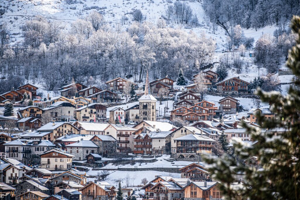 Traditional chalets and buildings covered in snow in St Martin de Belleville