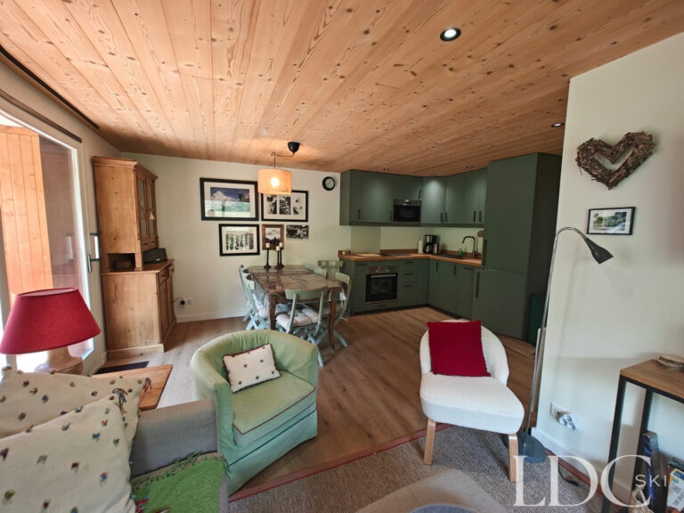 Biollay 43 lounge with open-plan kitchen and dining area