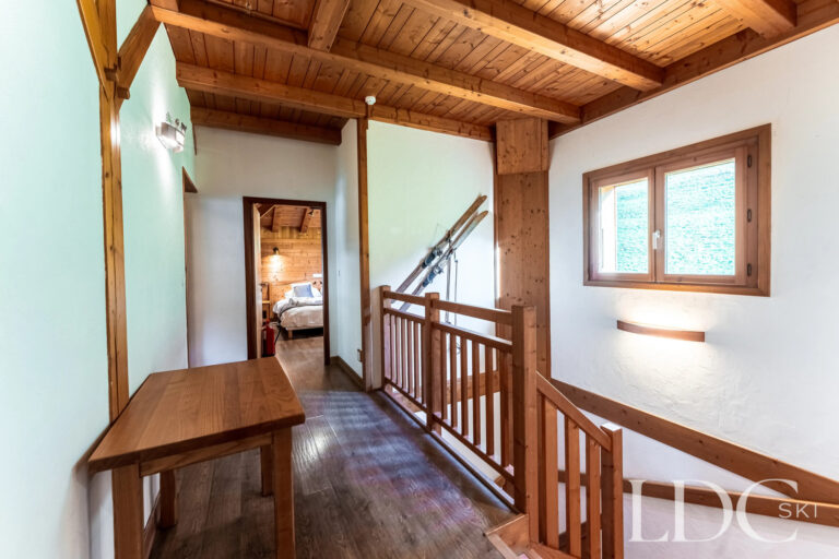 Timber-lined hall and landing at Cairn Lodge