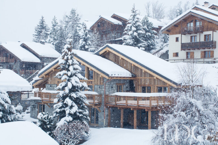 Exterior of Chalet Astilla surrounded by snow in St Martin de Belleville