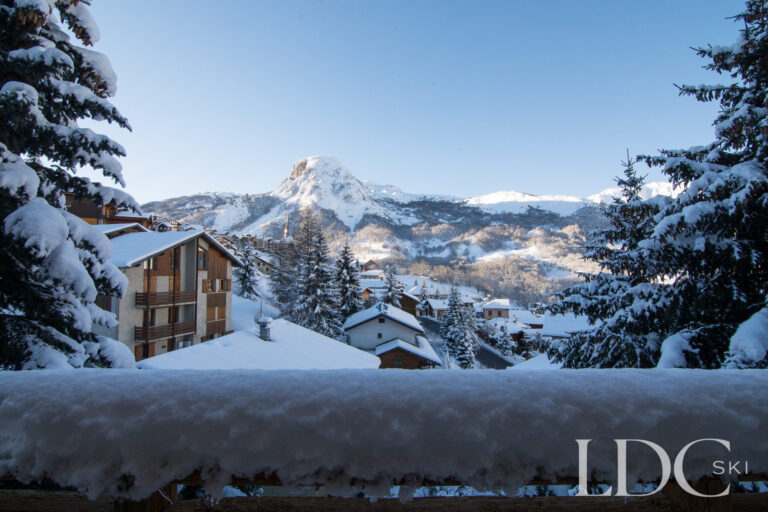 Snow-covered mountain and village views from Chalet Astilla in St Martin de Belleville