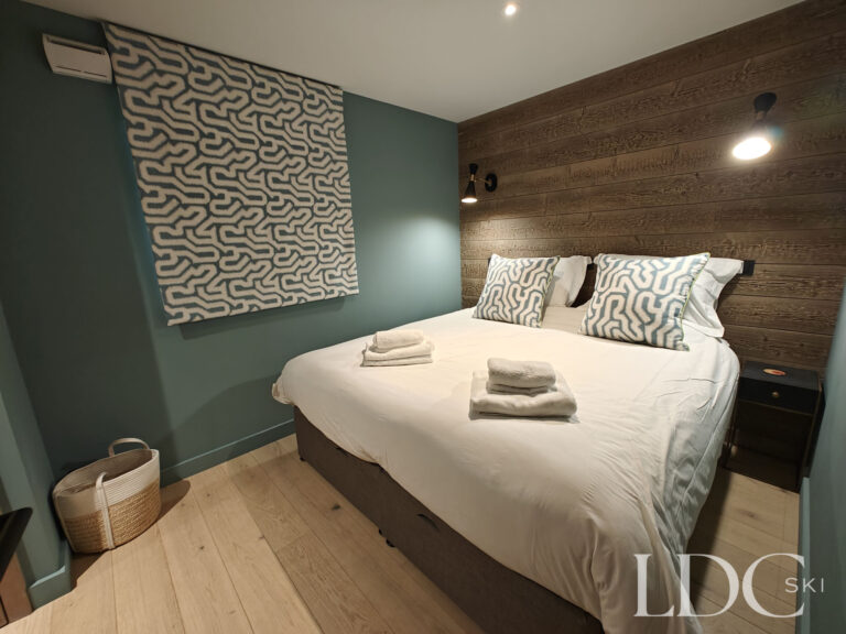 Comfortable double bedroom with contemporary Alpine décor at Chalet Chardon in St Martin de Belleville