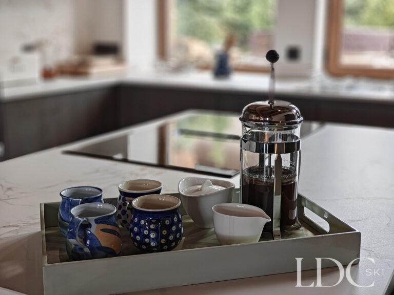 Coffee machine and kitchen counter at Chalet Chardon