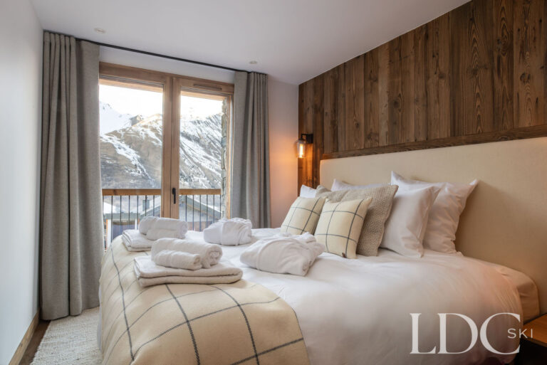 Double bedroom at Chalet de Beauvoir with contemporary alpine décor and mountain views