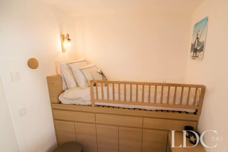 Bernardie child’s sleeping area with small bed and storage