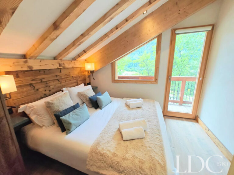Comfortable double bedroom at Chalet Camarine St Marin de Belleville