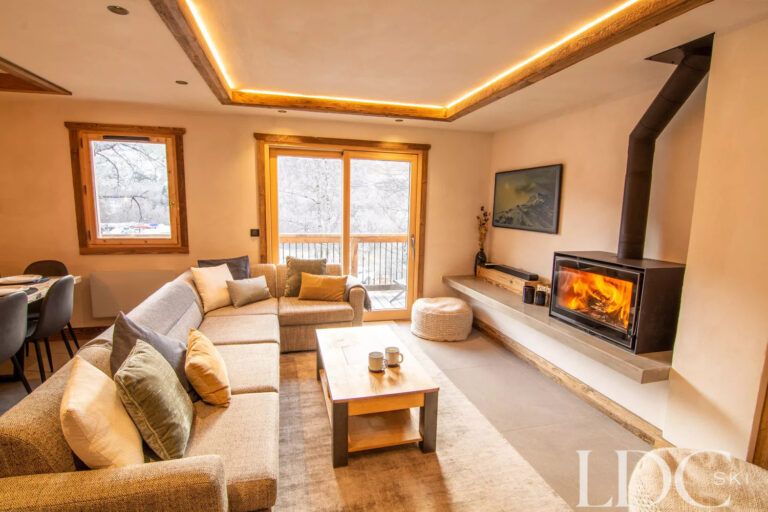 Comfortable seating area in the lounge at Chalet Camarine