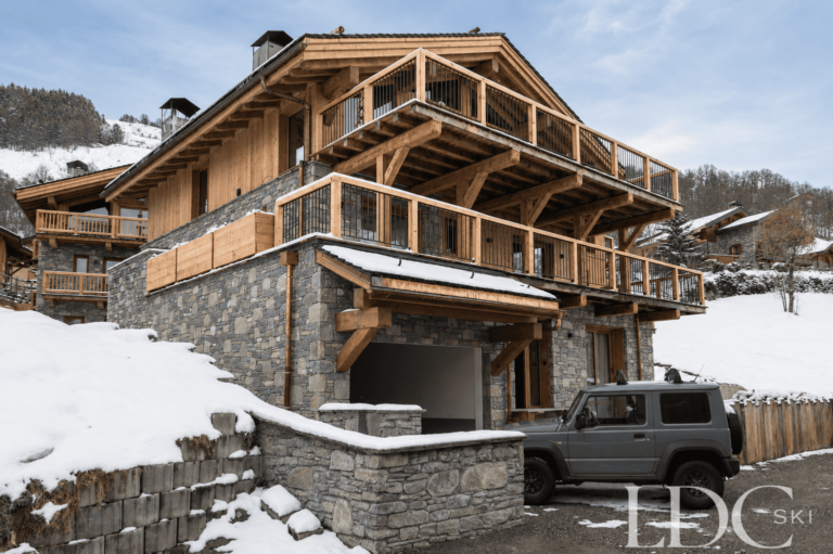Exterior of Chalet Montana surrounded by snow in St Martin de Belleville