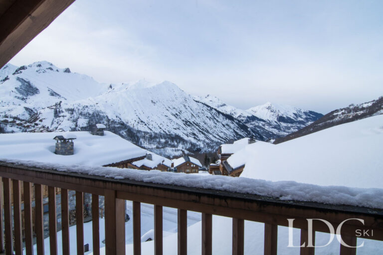 Snowy mountain views from the balcony at Chalet Riondaz in St Martin de Belleville