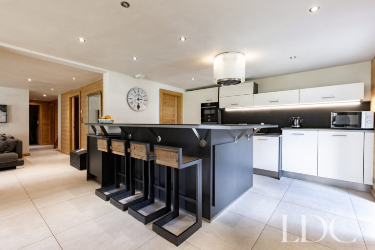 Contemporary bar and kitchen area at La Ferme de la Couttetaz in Morzine