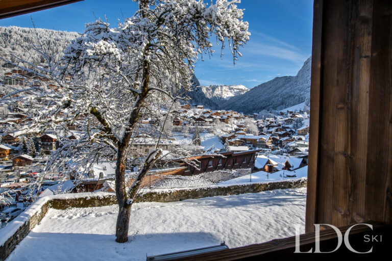 Snowy view across Morzine from La Ferme de la Couttetaz