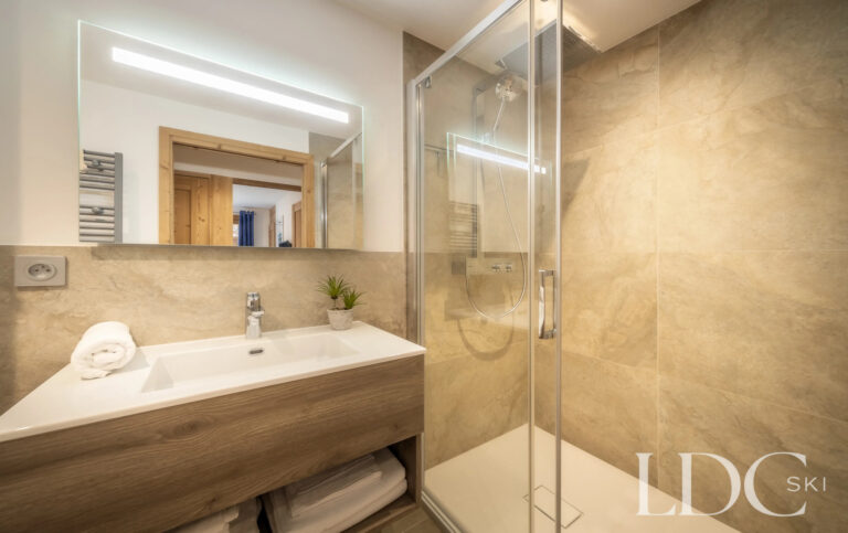 Les Deux Frères bathroom with walk-in shower and modern vanity