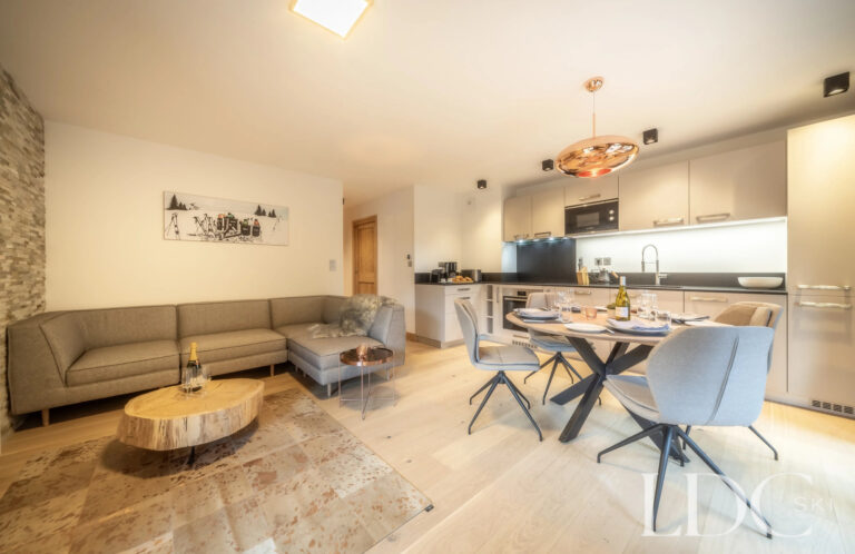 Les Deux Frères contemporary kitchen and dining area with doors opening outside