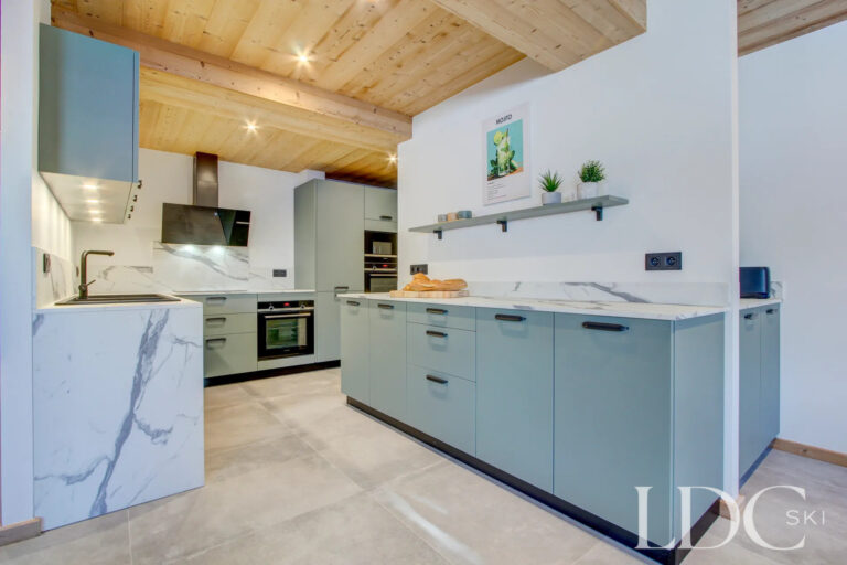 Piste Rouge contemporary kitchen with breakfast bar
