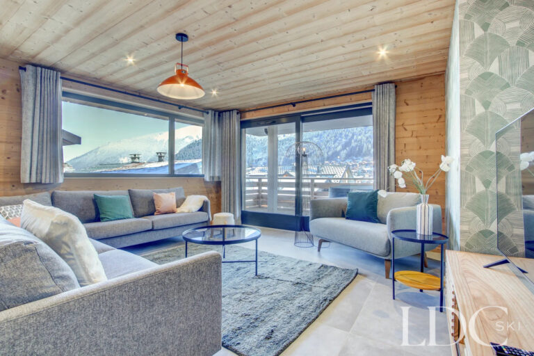 Piste Rouge lounge with panoramic mountain views in Morzine