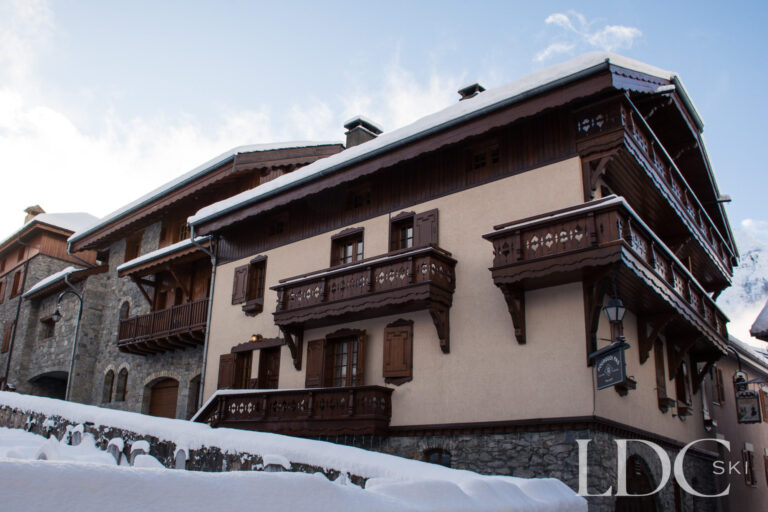 Snow-covered exterior of the Alice Velut building in St Martin de Belleville, home to Perce Neige and the neighbouring apartments