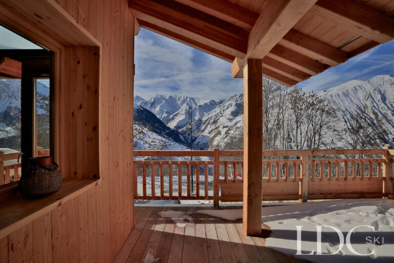 Panoramic mountain view from the terrace at Chalet Aphylla in St Martin de Belleville