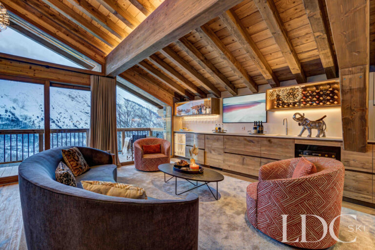 Chalet Constantia's private bar beneath the vaulted timber ceiling