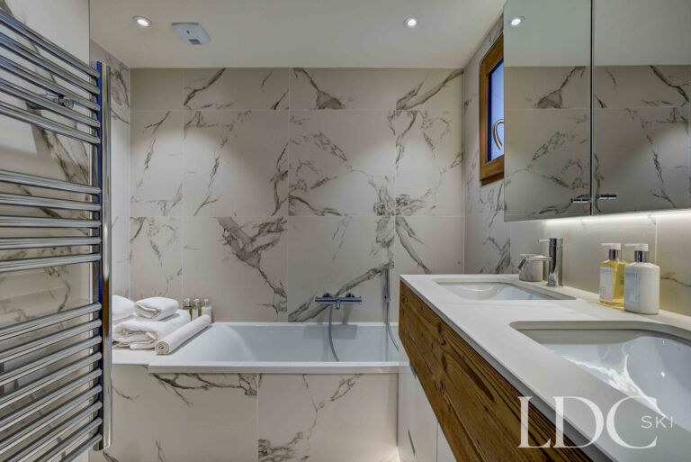 Marble-finished ensuite bathroom at Chalet Constantia