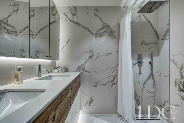 Contemporary marble ensuite shower room at Chalet Constantia