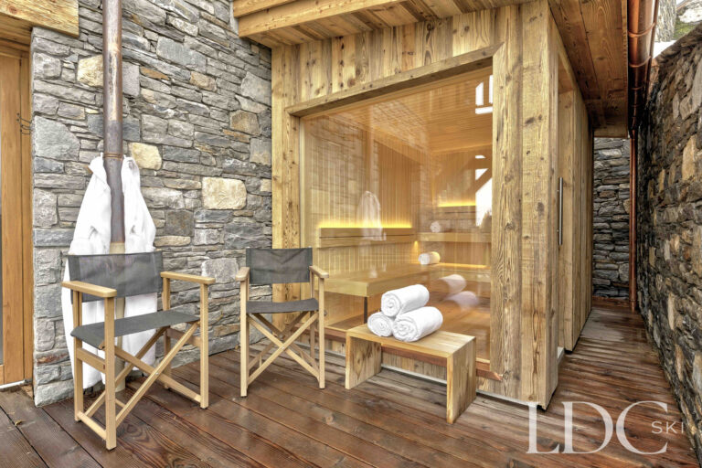 Private timber sauna opening onto the terrace at Chalet Constantia