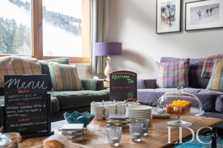 Afternoon tea laid out in the lounge at catered Chalet Pasarale in Méribel