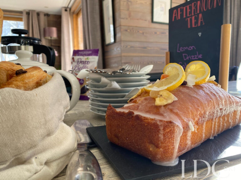 Homemade lemon drizzle cake prepared for afternoon tea at catered Chalet Pasarale