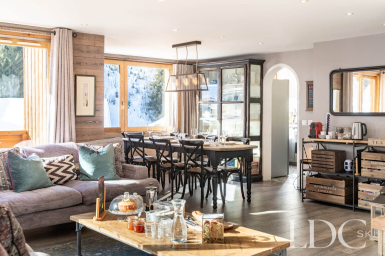 Afternoon tea laid out beside the dining area at catered Chalet Quatre Meules
