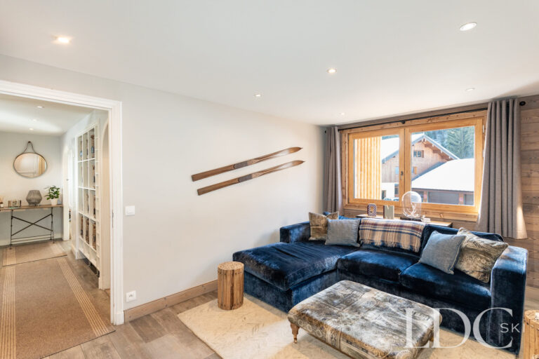 TV room leading from the entrance hall at Chalet Quatre Meules