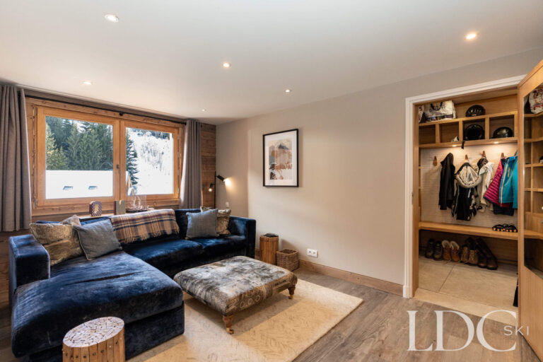 TV room leading to the boot room at Chalet Quatre Meules