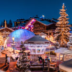 Illuminated carousel in Courchevel 1850 on a snowy winter evening. © Courchevel Tourisme