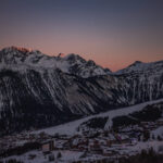 Winter sunset over Courchevel 1850 and the surrounding mountains. © Courchevel Tourisme