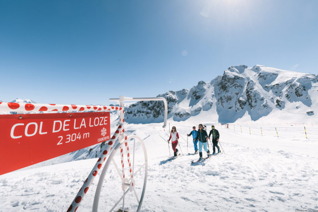 Ski touring through the snowy mountain landscape of the Courchevel ski area. © Courchevel Tourisme