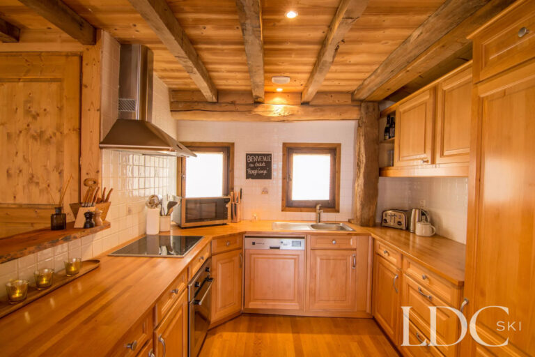 Fully equipped wooden kitchen at Encombres Tête de Fer in St Martin de Belleville