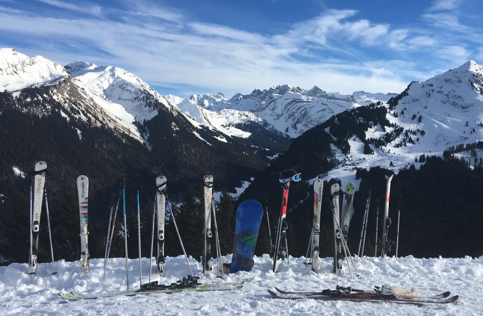 Skis and snowboards ready for a day on the slopes