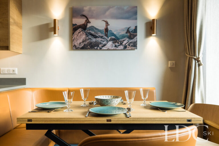 Dining area with built-in banquette seating at La Florette
