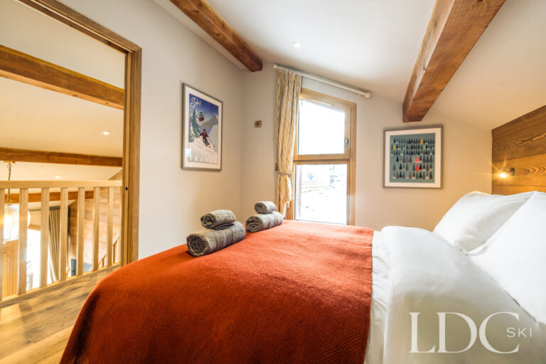 Master bedroom beside the timber balustrade at La Florette